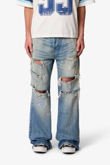 COWBOY DISTRESSED KICK FLARE DENIM