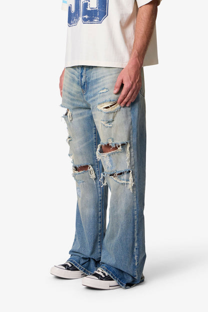 COWBOY DISTRESSED KICK FLARE DENIM