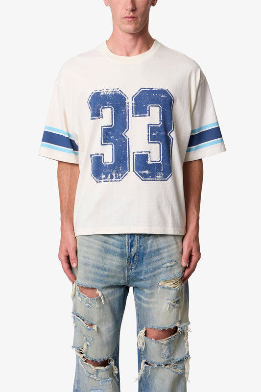 VARSITY TEE