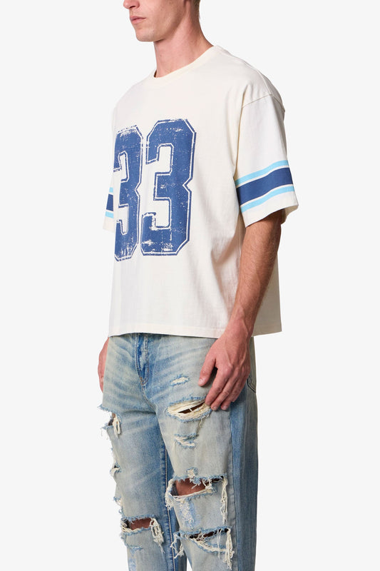 VARSITY TEE
