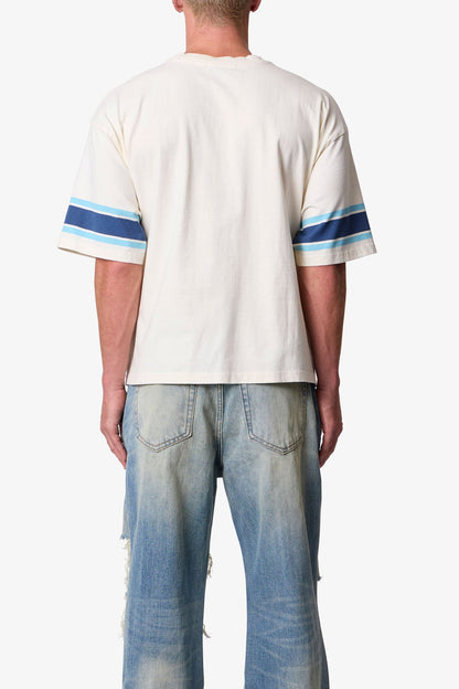 VARSITY TEE