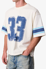 VARSITY TEE