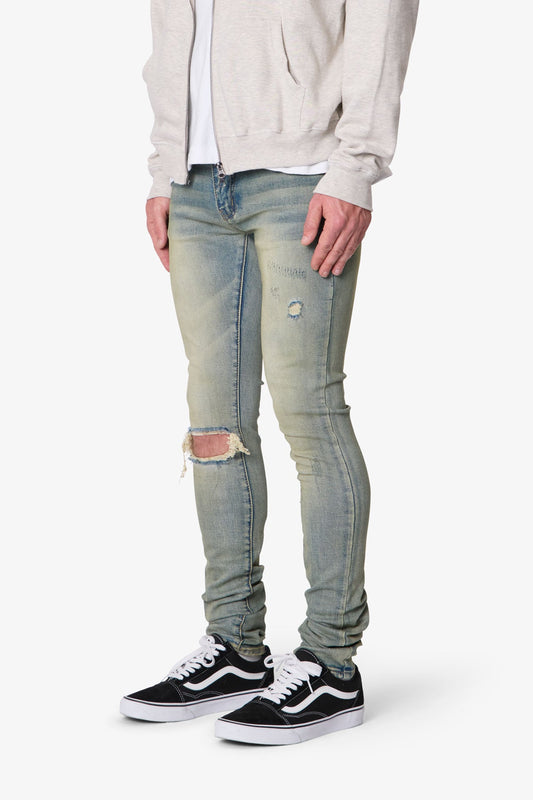 X721 DUSTED SKINNY DENIM